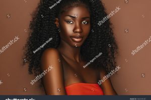 stock-photo-african-beautiful-woman-portrait-brunette-curly-haired-young-model-with-dark-skin-and-perfect-smile-1563195187