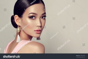 stock-photo-asian-model-fashion-girl-with-tassel-earrings-and-pink-dress-678404389