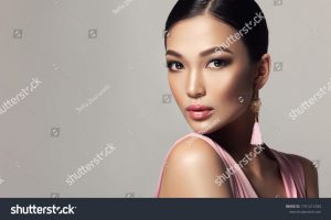 stock-photo-asian-model-fashion-girl-with-tassel-earrings-and-pink-dress-cosmetology-beauty-and-clothing-1751214182