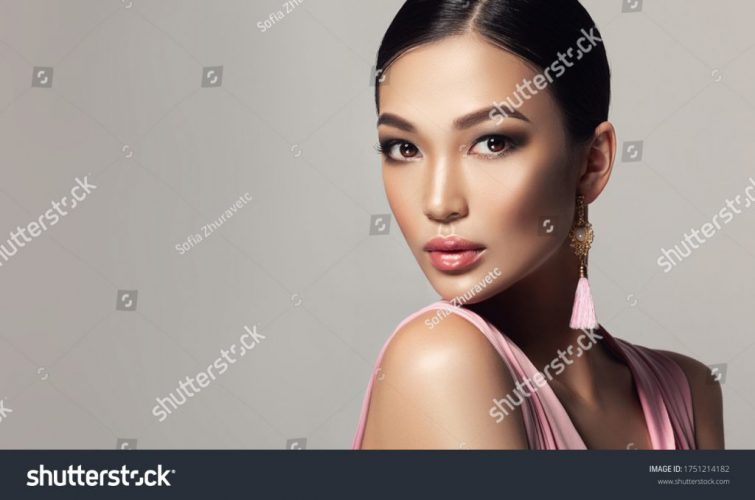 stock-photo-asian-model-fashion-girl-with-tassel-earrings-and-pink-dress-cosmetology-beauty-and-clothing-1751214182