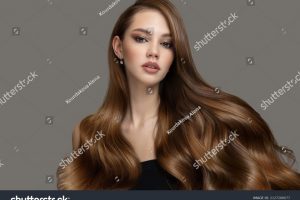 stock-photo-beautiful-fashion-woman-long-curly-big-curls-hair-and-makeup-2127288077