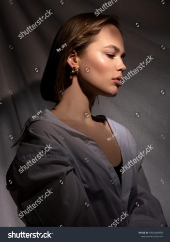 stock-photo-beautiful-female-model-beauty-woman-model-test-portrait-with-fashion-girl-in-shirt-and-jeans-on-1900485970