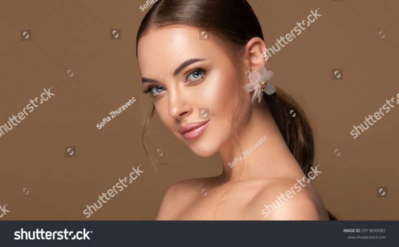 stock-photo-beautiful-girl-fashionable-and-stylish-woman-in-trendy-jewelry-big-earrings-curly-ponytail-2013850082