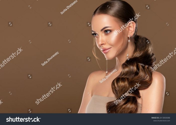 stock-photo-beautiful-girl-fashionable-and-stylish-woman-in-trendy-jewelry-big-earrings-curly-ponytail-2013850088