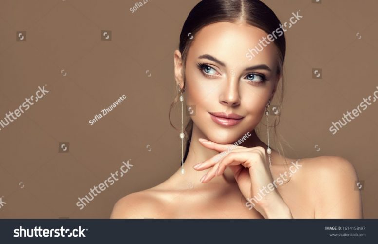 stock-photo-beautiful-girl-fashionable-and-stylish-woman-in-trendy-jewelry-big-earrings-fashion-look-1614158497
