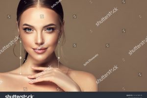 stock-photo-beautiful-girl-fashionable-and-stylish-woman-in-trendy-jewelry-big-earrings-fashion-look-1614158518