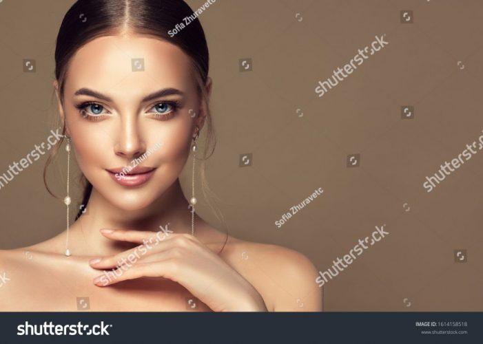 stock-photo-beautiful-girl-fashionable-and-stylish-woman-in-trendy-jewelry-big-earrings-fashion-look-1614158518
