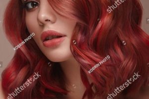 stock-photo-beautiful-girl-with-multi-colored-hair-and-classic-make-up-and-hairstyle-beauty-face-2127069206