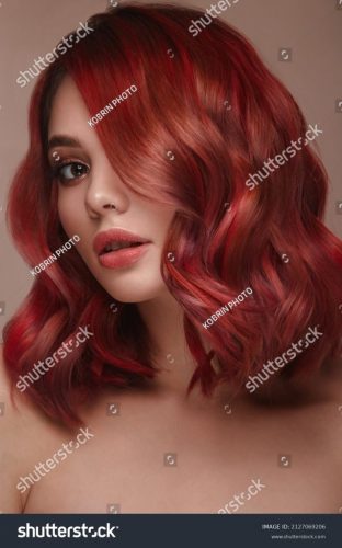 stock-photo-beautiful-girl-with-multi-colored-hair-and-classic-make-up-and-hairstyle-beauty-face-2127069206