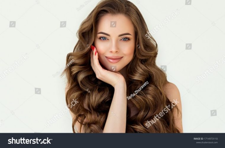 stock-photo-beautiful-laughing-brunette-model-girl-with-long-curly-hair-smiling-woman-hairstyle-wavy-1714973110
