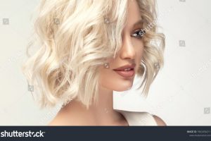 stock-photo-beautiful-model-girl-with-short-hair-beauty-smiling-woman-with-blonde-curly-hairstyle-dye-1962456211
