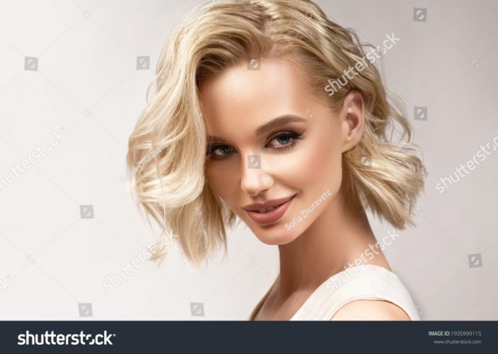 stock-photo-beautiful-model-girl-with-short-hair-beauty-woman-with-blonde-curly-hairstyle-dye-fashion-1935999115