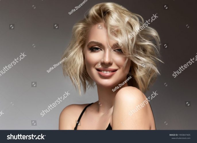 stock-photo-beautiful-model-girl-with-short-hair-beauty-woman-with-blonde-curly-hairstyle-dye-fashion-1993847405