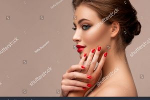 stock-photo-beautiful-woman-showing-red-lips-and-manicure-nails-blue-eyed-model-girl-evening-bright-1845326368