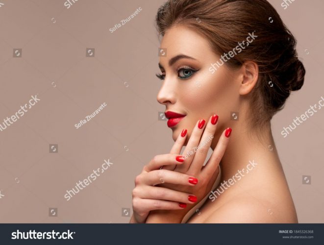 stock-photo-beautiful-woman-showing-red-lips-and-manicure-nails-blue-eyed-model-girl-evening-bright-1845326368