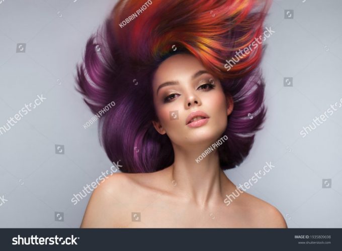 stock-photo-beautiful-woman-with-multi-colored-hair-and-creative-make-up-and-hairstyle-beauty-face-1935809698