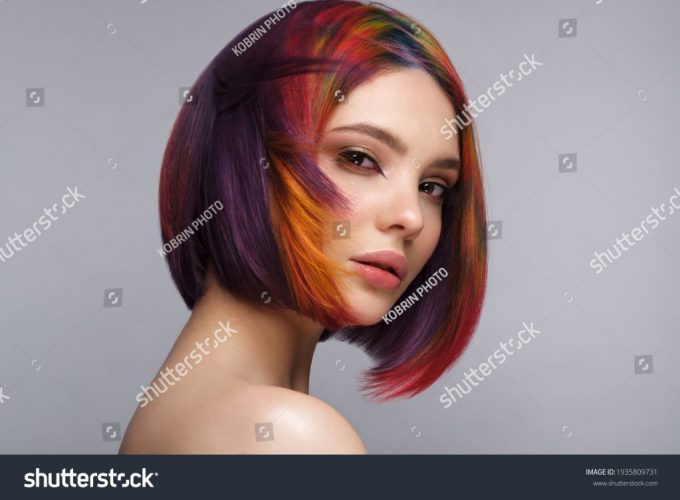 stock-photo-beautiful-woman-with-multi-colored-hair-and-creative-make-up-and-hairstyle-beauty-face-1935809731