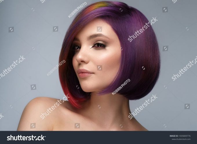 stock-photo-beautiful-woman-with-multi-colored-hair-and-creative-make-up-and-hairstyle-beauty-face-1935809776