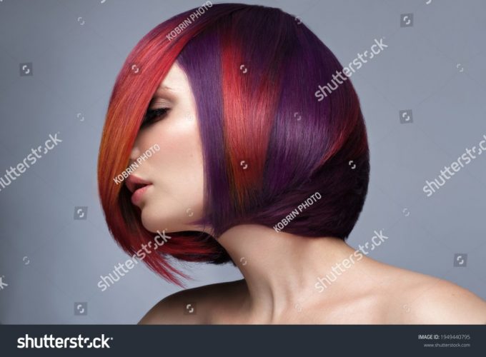stock-photo-beautiful-woman-with-multi-colored-hair-and-creative-make-up-and-hairstyle-beauty-face-1949440795