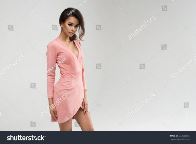 stock-photo-beauty-afro-young-woman-in-pink-dress-653688346