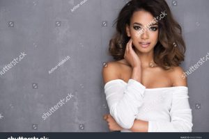 stock-photo-beauty-afro-young-woman-in-white-dress-666239884