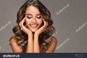 stock-photo-beauty-brunette-girl-with-long-shiny-curly-hair-beautiful-smiling-woman-model-wavy-hairstyle-1911831835