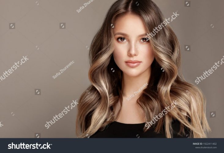 stock-photo-beauty-girl-with-long-and-shiny-wavy-hair-coloring-and-toning-shatush-and-balayash-1922411402