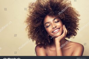 stock-photo-beauty-portrait-of-african-american-woman-with-clean-healthy-skin-on-beige-background-smiling-1805797573