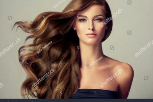 stock-photo-brunette-girl-with-long-and-shiny-wavy-hair-beautiful-model-with-curly-hairstyle-457580683