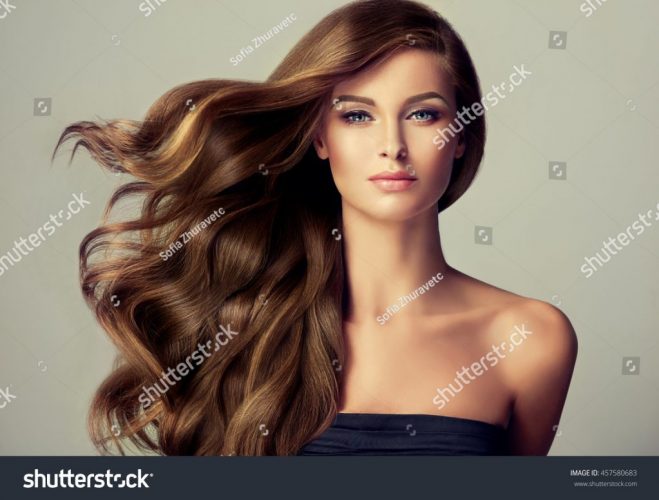 stock-photo-brunette-girl-with-long-and-shiny-wavy-hair-beautiful-model-with-curly-hairstyle-457580683
