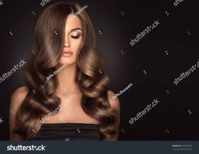 stock-photo-brunette-girl-with-long-and-shiny-wavy-hair-beautiful-model-with-curly-hairstyle-566875267