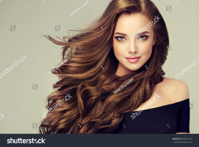 stock-photo-brunette-girl-with-long-and-shiny-wavy-hair-beautiful-model-with-curly-hairstyle-639921919