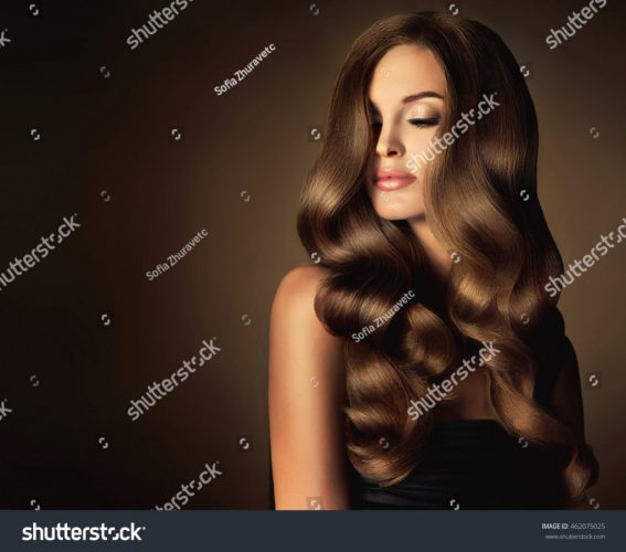 stock-photo-brunette-girl-with-long-and-shiny-wavy-hair-beautiful-model-with-curly-hairstyle-head-and-462075025