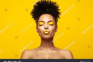 stock-photo-enjoyed-african-american-fashion-model-portrait-satisfied-brunette-young-woman-with-afro-hair-1351167989