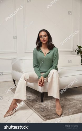 stock-photo-fashion-beautiful-model-sexy-pretty-lady-dark-woman-brunette-hair-wear-white-pants-green-top-1954723282