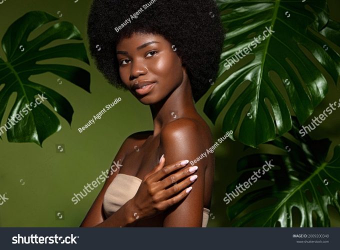 stock-photo-green-and-fresh-beauty-portrait-of-young-beautiful-african-american-woman-with-posing-against-2009200340
