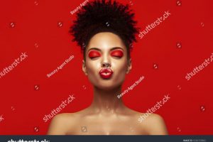 stock-photo-kiss-lips-share-love-valentine-day-african-makeup-face-satisfied-brunette-young-woman-with-afro-1636725802