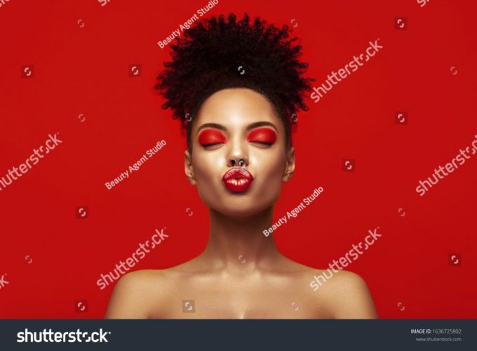 stock-photo-kiss-lips-share-love-valentine-day-african-makeup-face-satisfied-brunette-young-woman-with-afro-1636725802