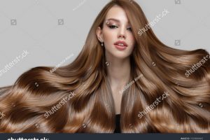 stock-photo-portrait-of-a-young-woman-with-luxurious-thick-hair-1929809483