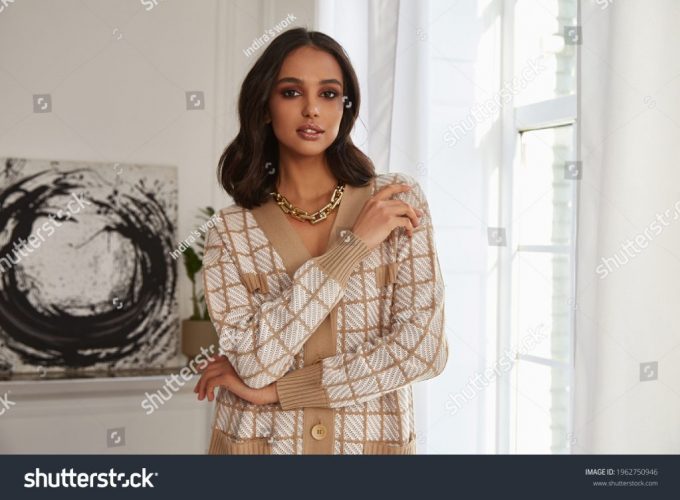 stock-photo-pretty-fashion-beautiful-woman-sexy-lady-brunette-curly-hair-dark-tanned-skin-wear-trend-clothes-1962750946