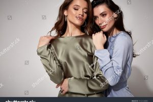 stock-photo-two-sexy-brunette-woman-luxury-lifestyle-bright-makeup-wear-natural-organic-silk-midi-dress-and-1912143682